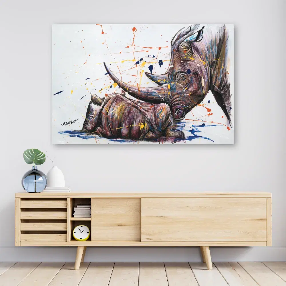 Rhino Bond print above a light wood sideboard