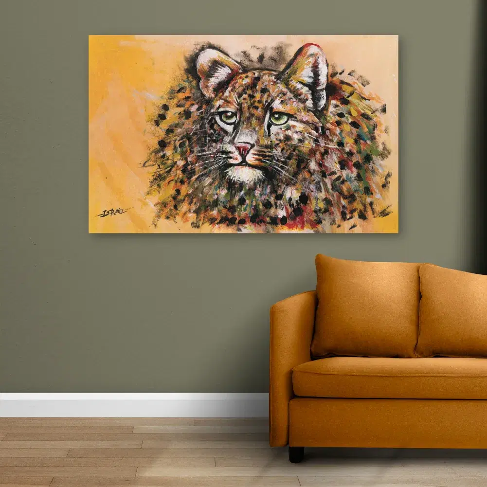 Ochre Vigil leopard print on an olive wall above a mustard sofa